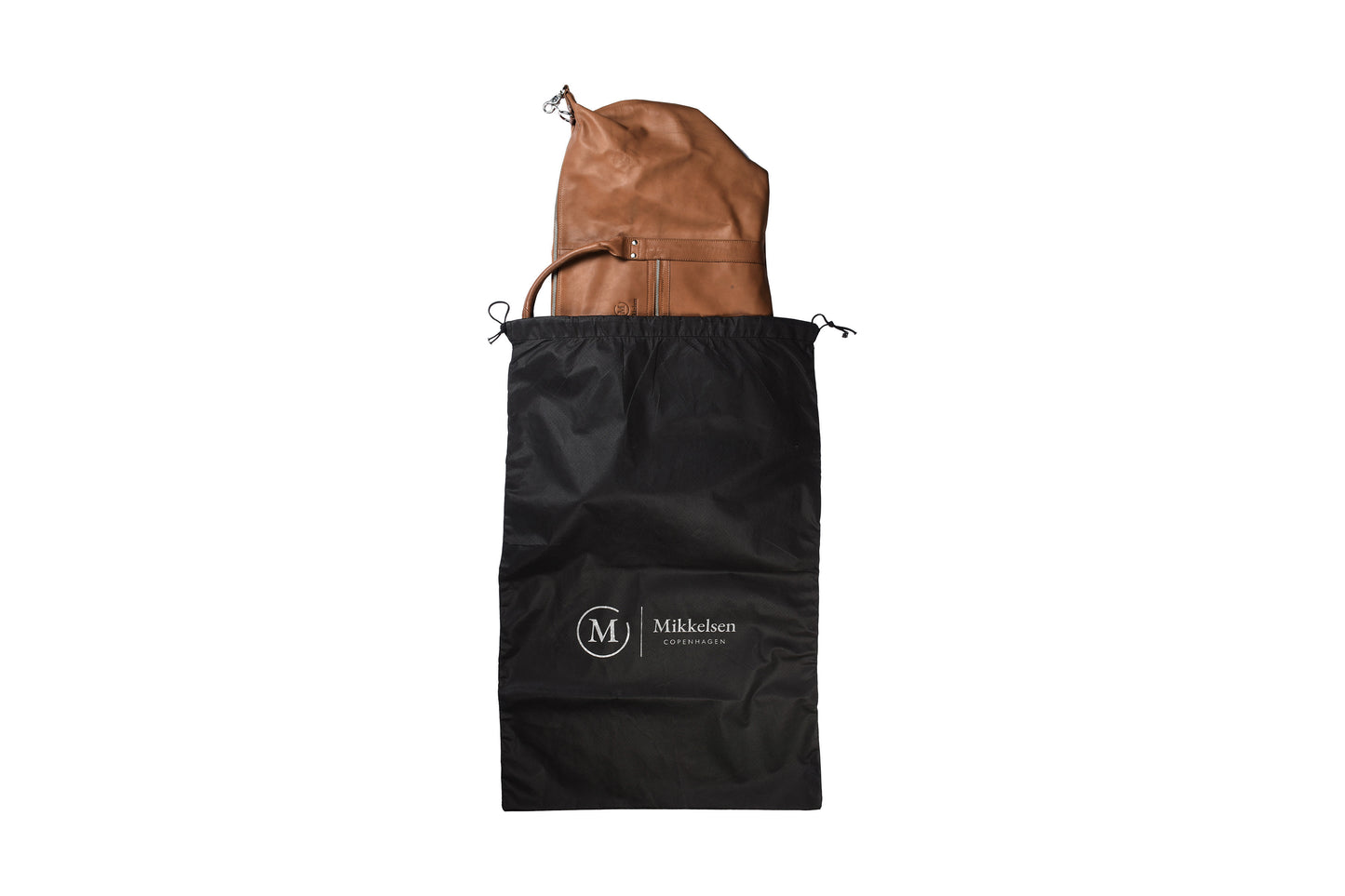 Mikkelsen Copenhagen cognac travel bag with dust bag included.