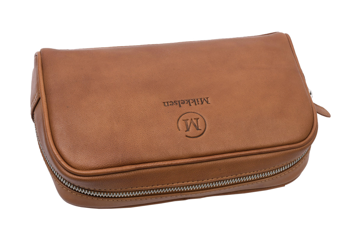Cognac leather toiletry bag, Scandinavian travel accessory.