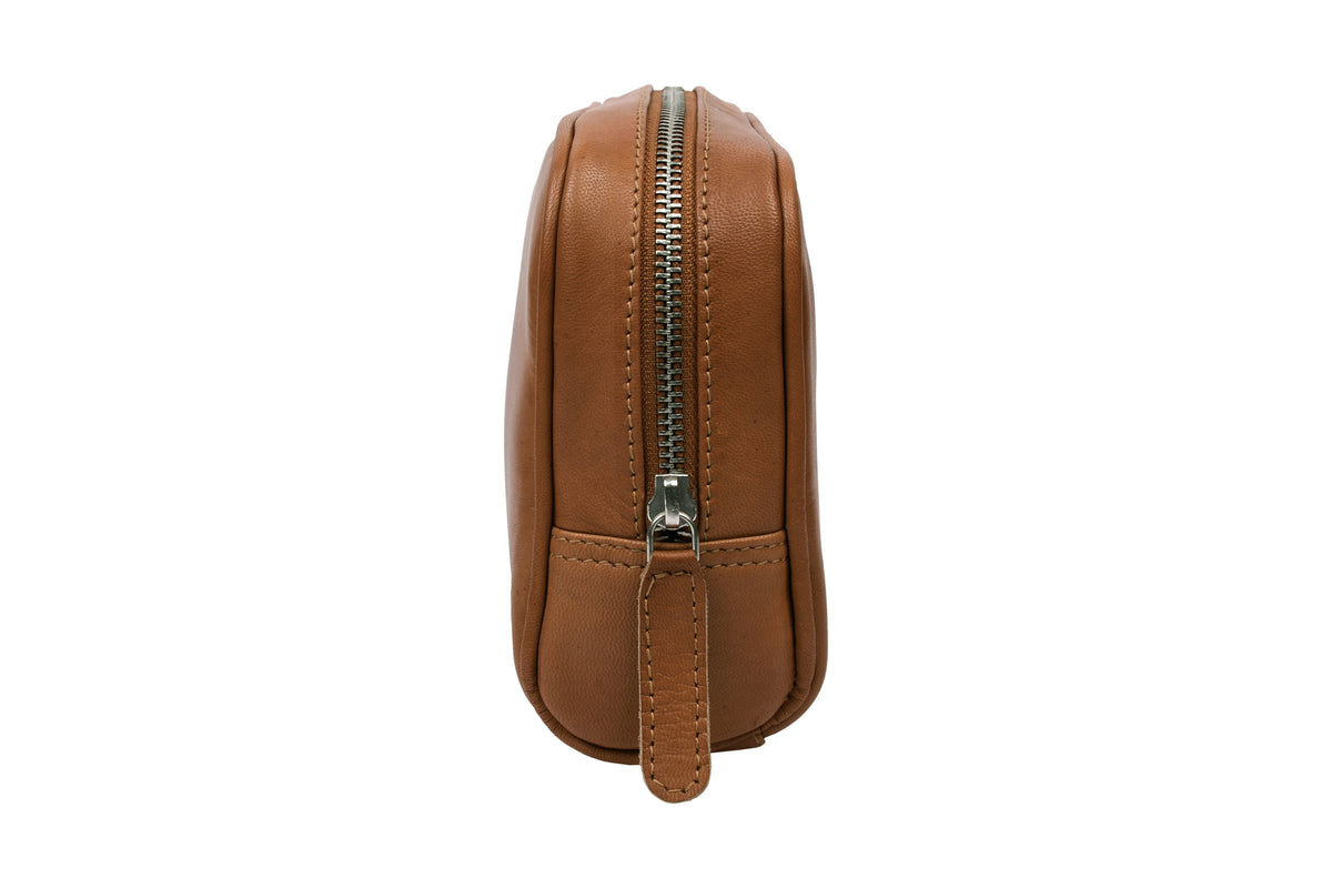 Close-up view YKK zipper, Cognac leather toiletry bag, Scandinavian travel accessory