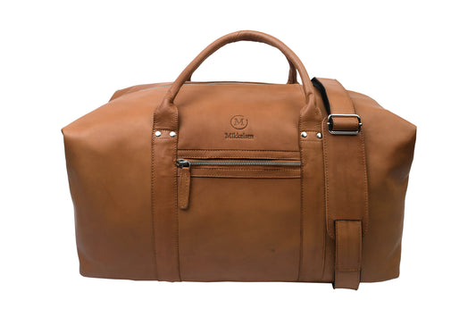 Mikkelsen Copenhagen Cognac Travel Bag, full-grain vegetable-tanned leather weekender with adjustable leather shoulder strap.